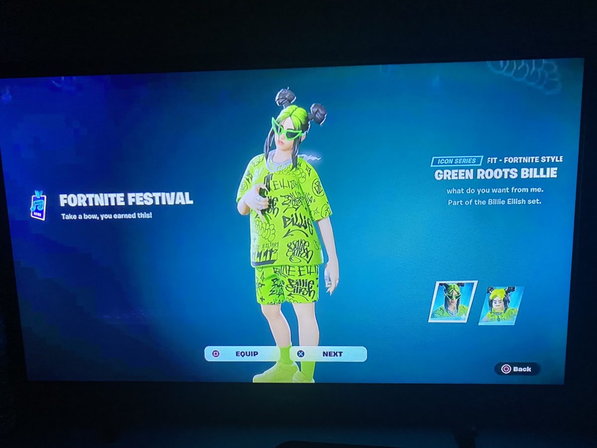 A picture capturing a students T.V. showing showing Billie Eilish in the game Fortnite.