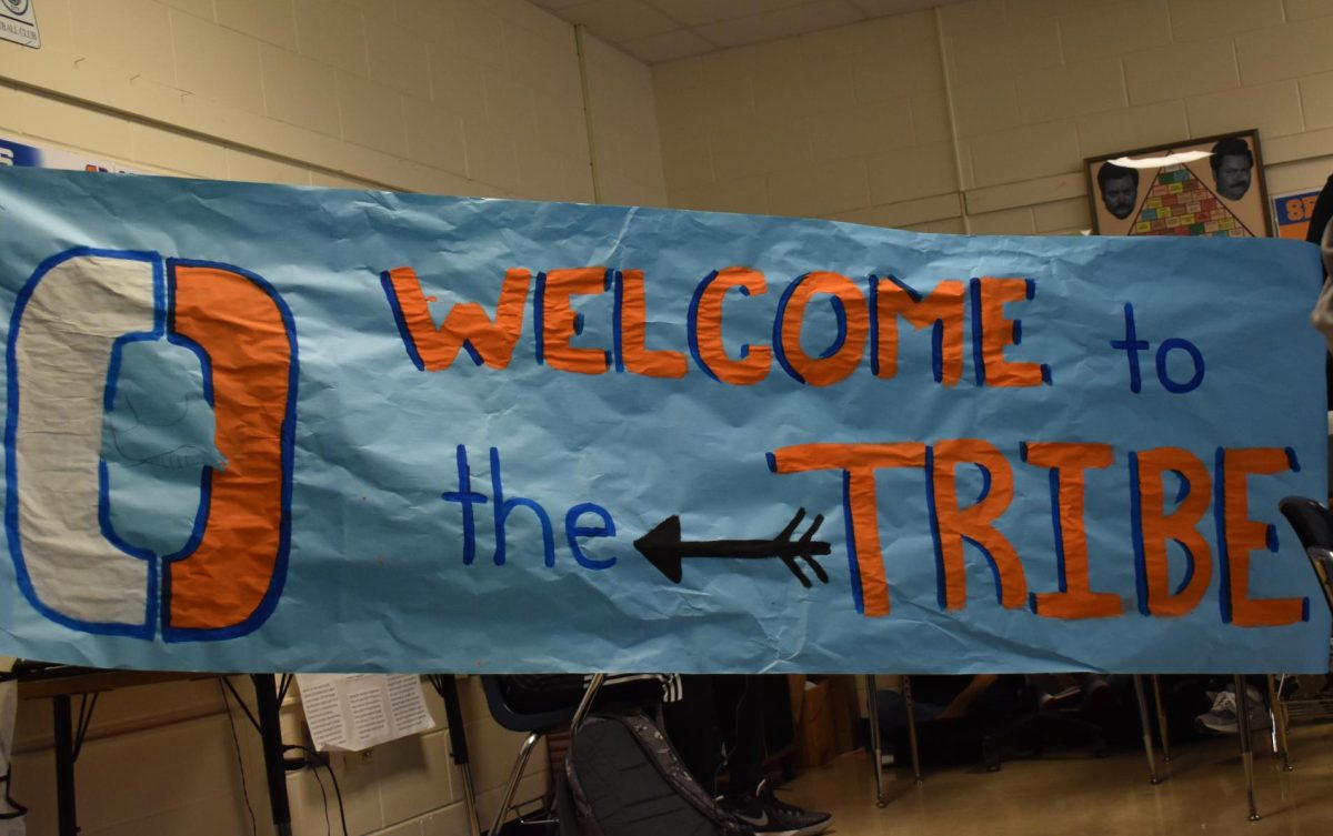 Student Government, NHS, and O-Town students welcome Maderia Beach students with signs.