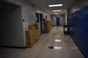 Boxes line the halls outside of shared classrooms.