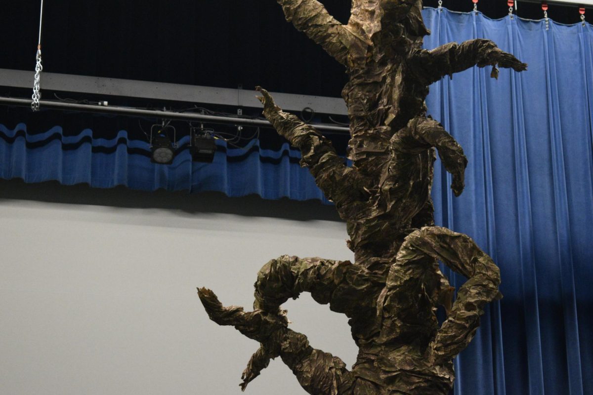 Strange tree from Narnia, painted by students, stands ready for the show. 