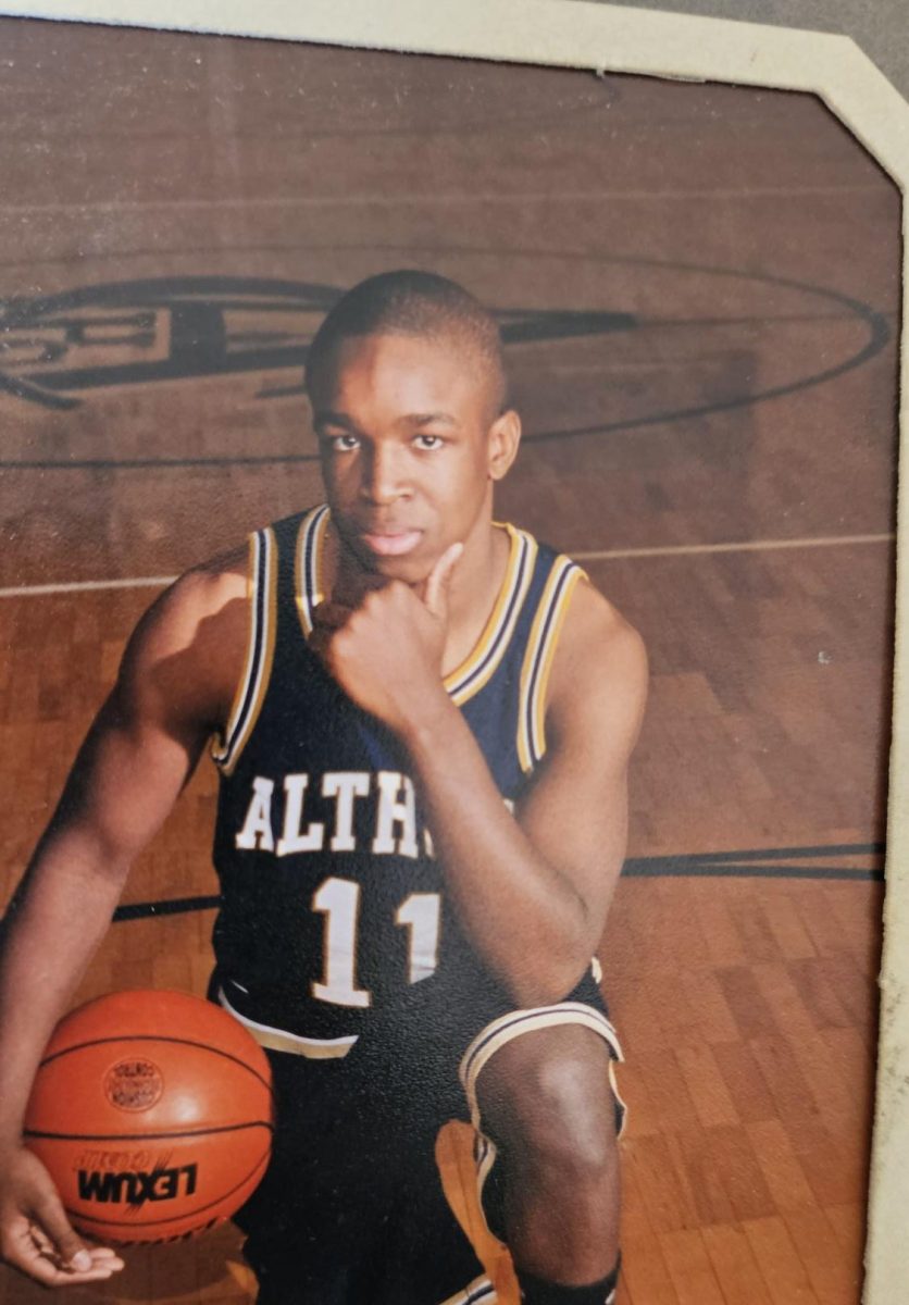 Mr. Hines wears his basketball uniform his sophomore year of high school in 2001