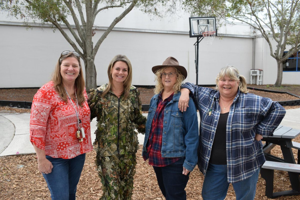 Teachers dress up for country vs. country club.