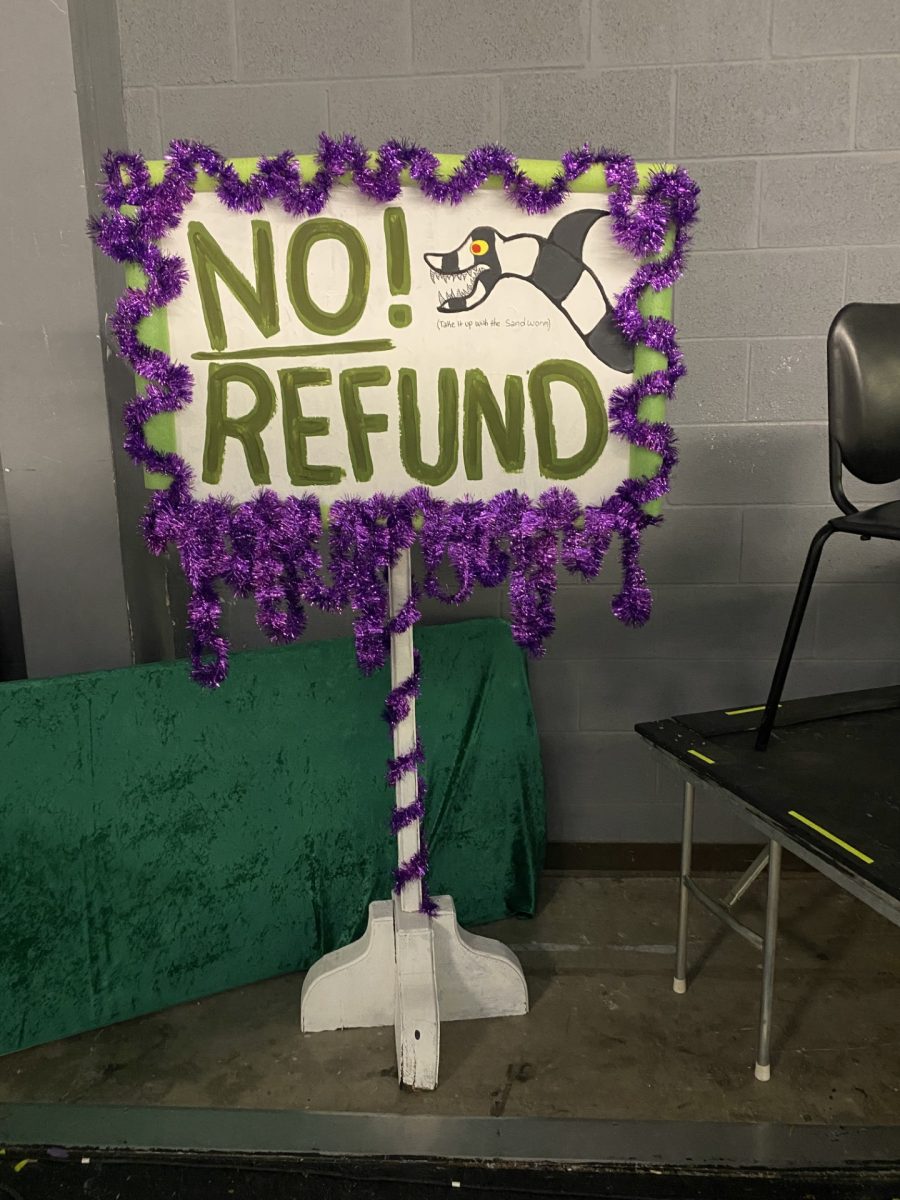 A "NO REFUND!" sign, made by students which will be included in a line in the play.